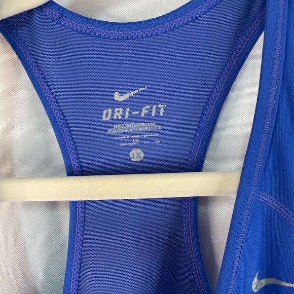 Nike racer back athletic top. This has a built in bra with great support. - Picture 3 of 3